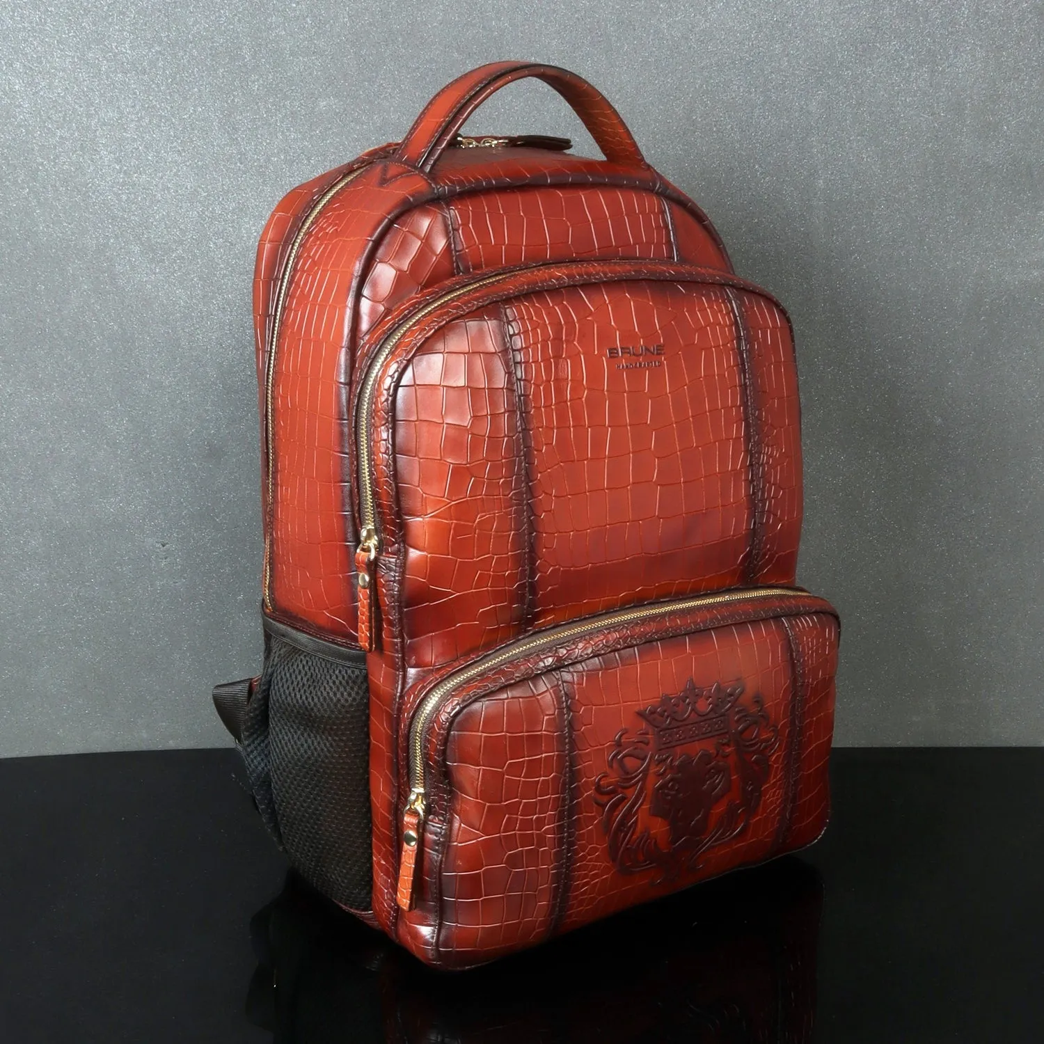 Tan Deep Cut Croco Print Leather Backpack Embossed Lion Multi-Step Pockets By Brune & Bareskin