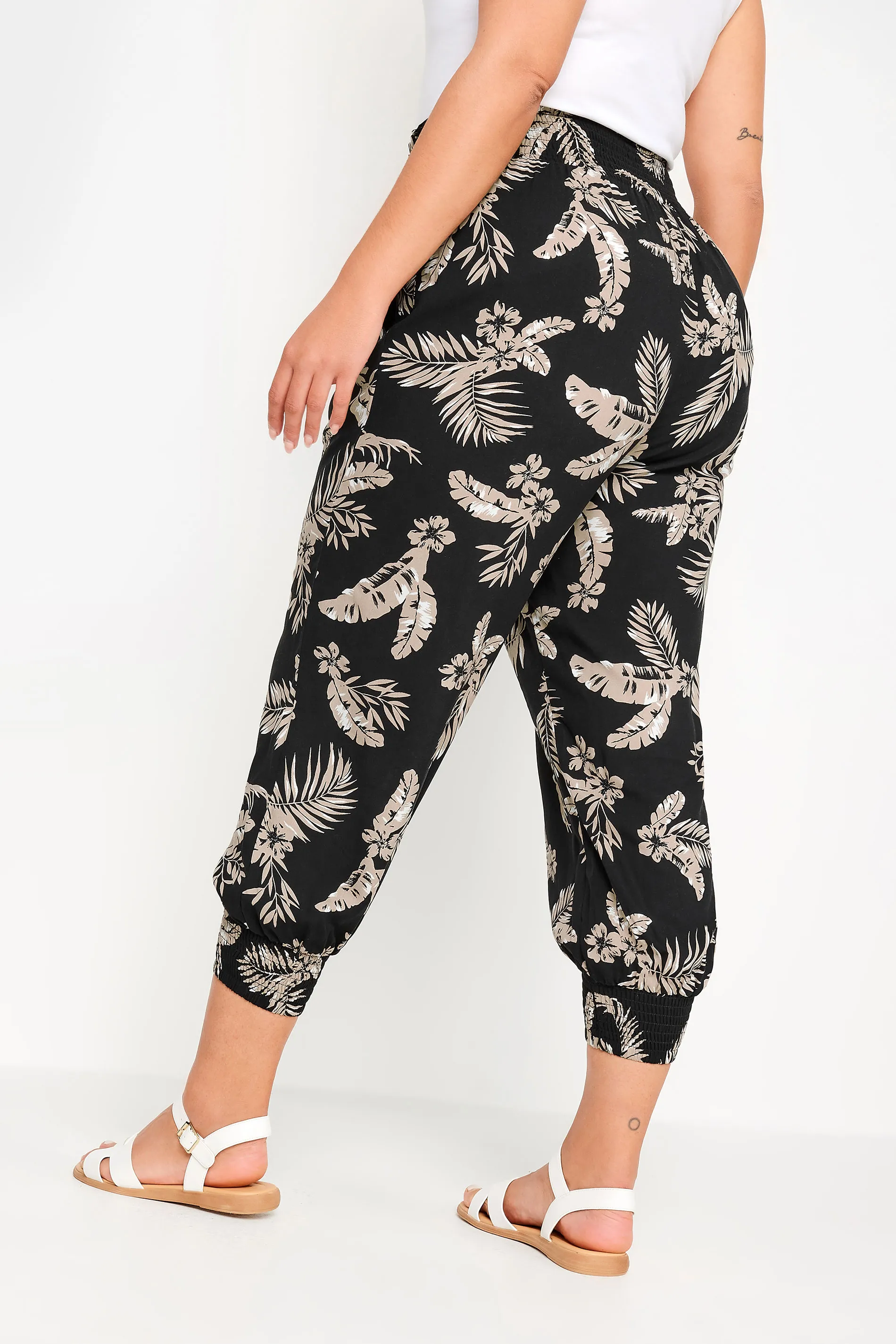 YOURS Curve Black Leaf Print Shirred Harem Trousers