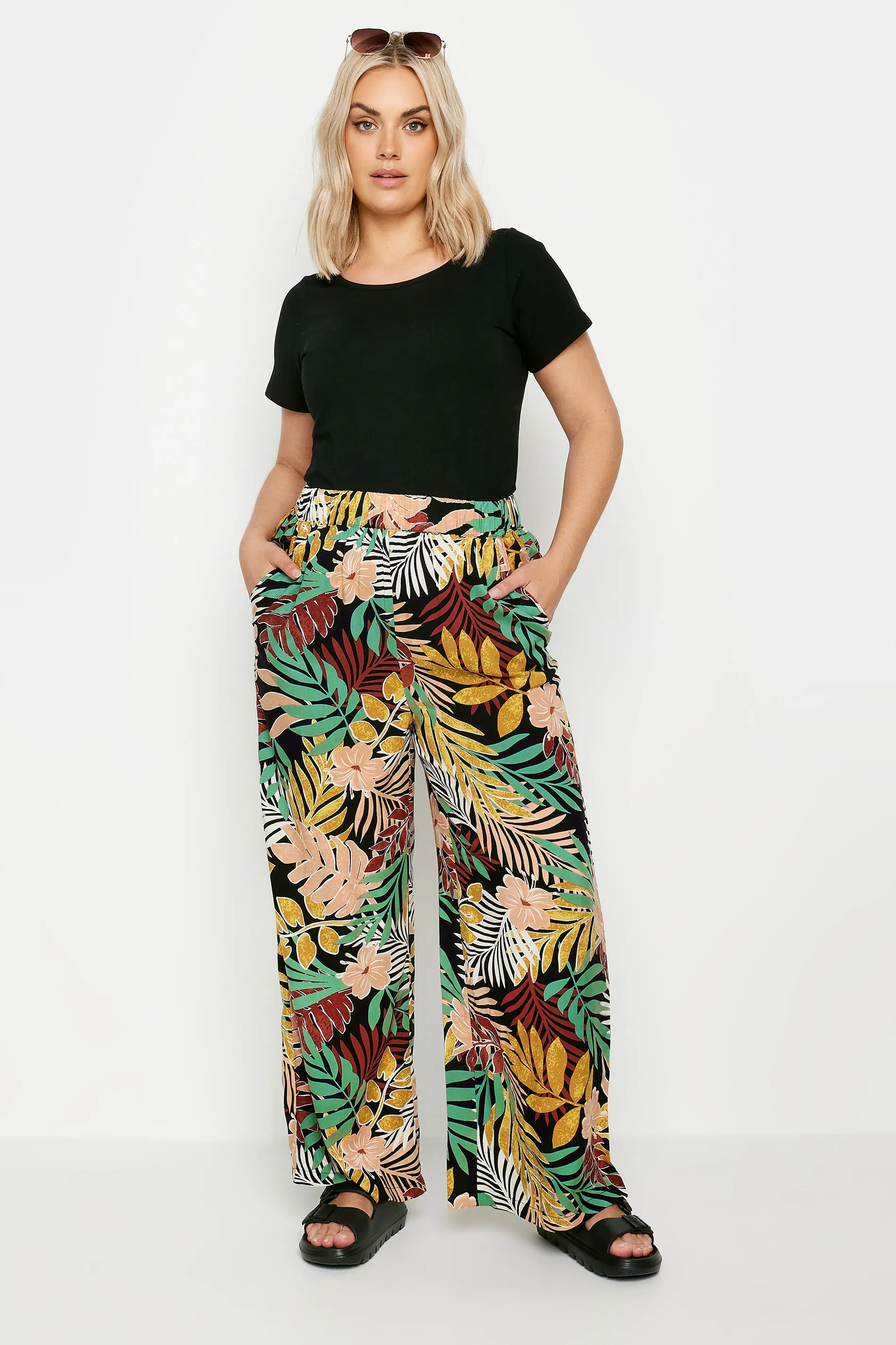 YOURS Curve Black Tropical Print Wide Leg Trousers